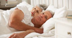 old couple laying together